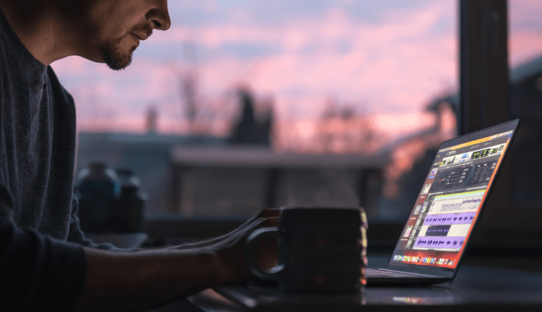 man-works-with-sound-laptop-early-morning_1